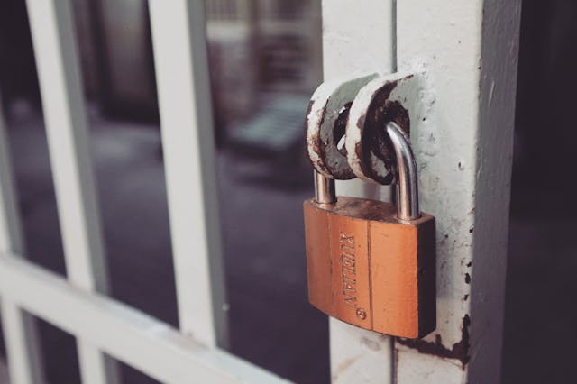 A padlock in a gate