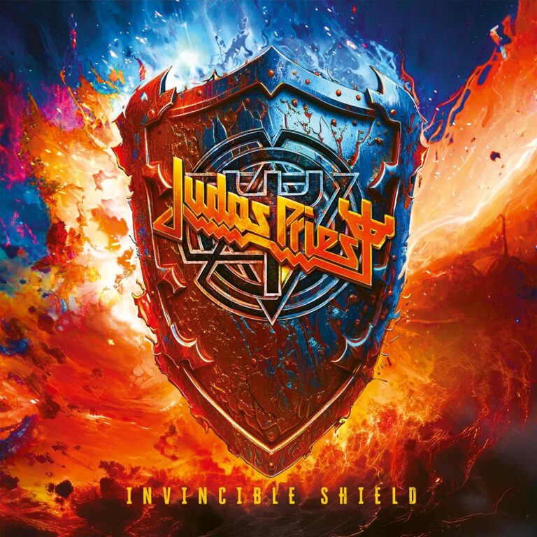 A metal shield with Judas Priest logo and surrounded by fire colors and blue